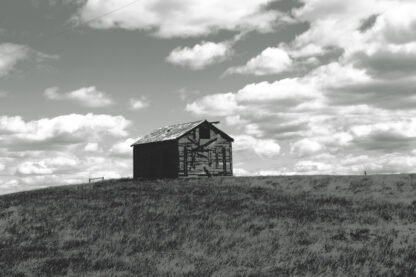 Photography by Carole Louvezy :  Old barn under a cloudy sky